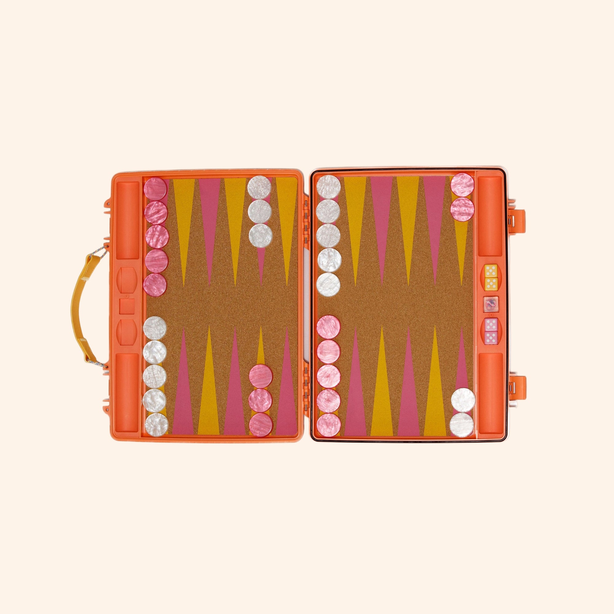 Open orange backgammon board with cork playing surface featuring mustard yellow and fuchsia triangles, pink and white checkers, and yellow handle